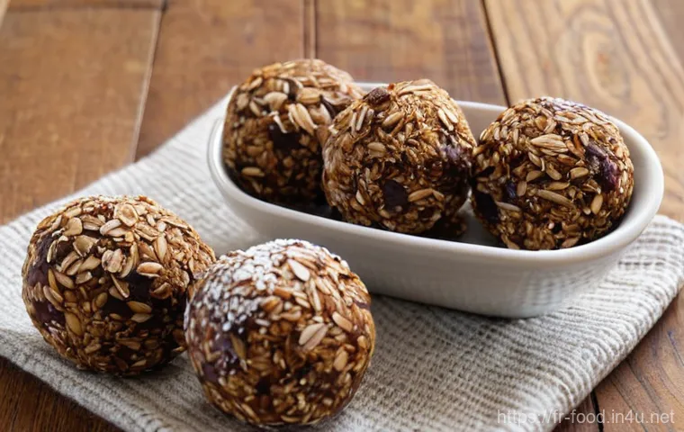 캠핑용 건강 간식 - **Vibrant Trail Mix in a Mountain Setting:** A close-up, high-angle shot of a hiker's hand reaching ...