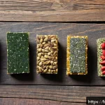 건강 간식 브랜드 - A vibrant close-up shot of a variety of healthy snack bars and bites made with superfoods like chia ...